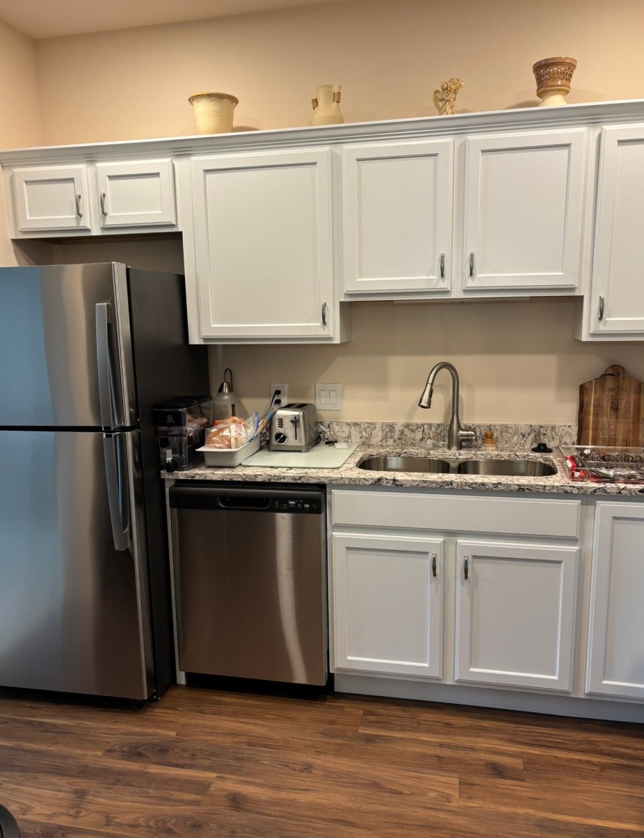The same kitchen cleared, cleaned, and set up after the move